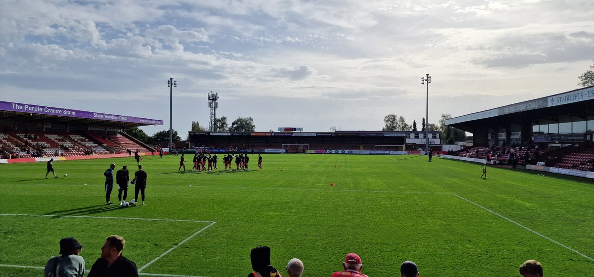 MarkL83's tweet photo. Part 1 of the pyramid challenge with @EyeballPaul55 done! First match was @khfcofficial vs @WealdstoneFC. Not the most thrilling match, but a frantic end none the less. The North stand was absolutely bonkers when Kiddie scored. Was a really good day! https://t.co/GCz7EVRWz9