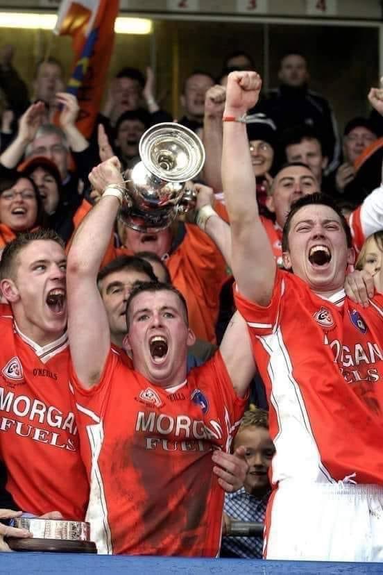 ArdGaa's tweet photo. A lot of these young men have just or will soon celebrate their fortieth birthdays! Today it’s happy anniversary to the @Armagh_GAA Under-21’s as we recall a memorable day in Breffni Park in October 2004! https://t.co/ppozVmTen0