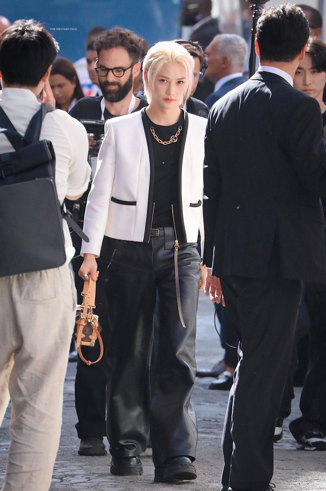 Viral Takes on X: Felix of Stray Kids attends the Louis Vuitton