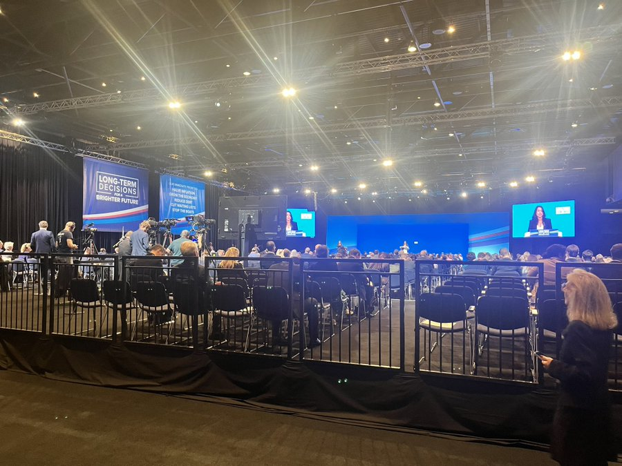 archer_rs's tweet photo. Day two, move to smaller hall as all the empty seats in the bigger hall on day one was embarrassing. New smaller hall, still half empty.
#ConservativePartyConference https://t.co/thR8z9EG2I
