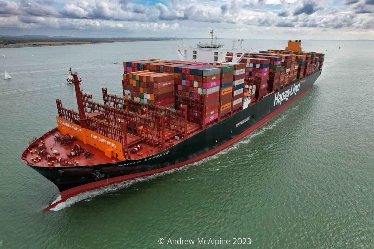 Maritimegeek's tweet photo. Over the weekend @HapagLloydAG newest boxship #ManilaExpress made her maiden visit to the port of #Southampton she is the second vessel in a class 12 new dual-fuel vessels with a capacity of 23,664 TEU. She is seen here passing Calshot. #containership #dronephotography https://t.co/ff7H204Iuh