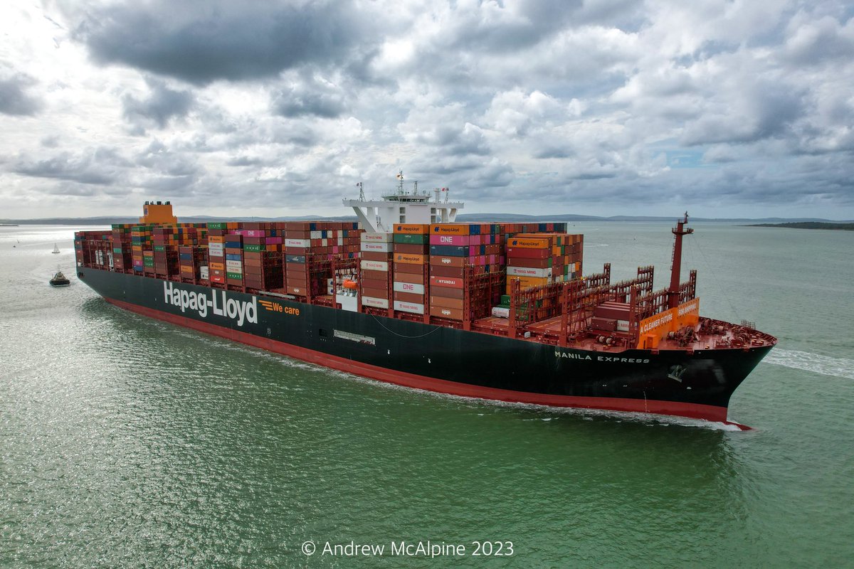 Maritimegeek's tweet photo. Over the weekend @HapagLloydAG newest boxship #ManilaExpress made her maiden visit to the port of #Southampton she is the second vessel in a class 12 new dual-fuel vessels with a capacity of 23,664 TEU. She is seen here passing Calshot. #containership #dronephotography https://t.co/ff7H204Iuh