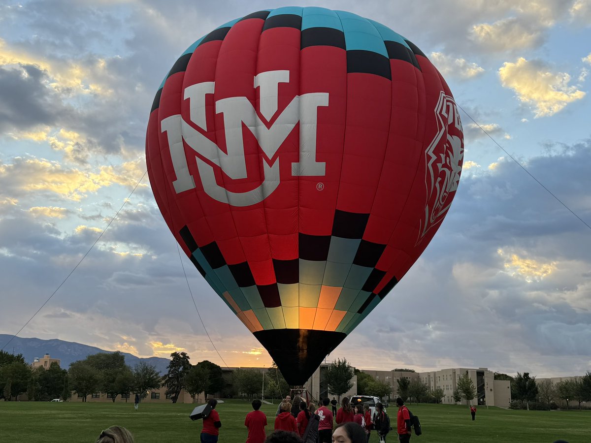 ProfBenavidez's tweet photo. UNM debuts “Cherry on Top,” their new hot air balloon featuring the school’s institutional and athletic logos.  🍒🔥 https://t.co/TKGNXdrBcD
