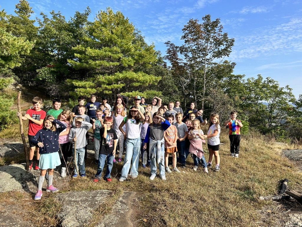 "In the Zone" is a ton of fun! Last week, the program took students on a hike to the top of  Hackensack Hill. At the summit, we had a beautiful view of Warrensburg and pointed out some of our favorite local places.