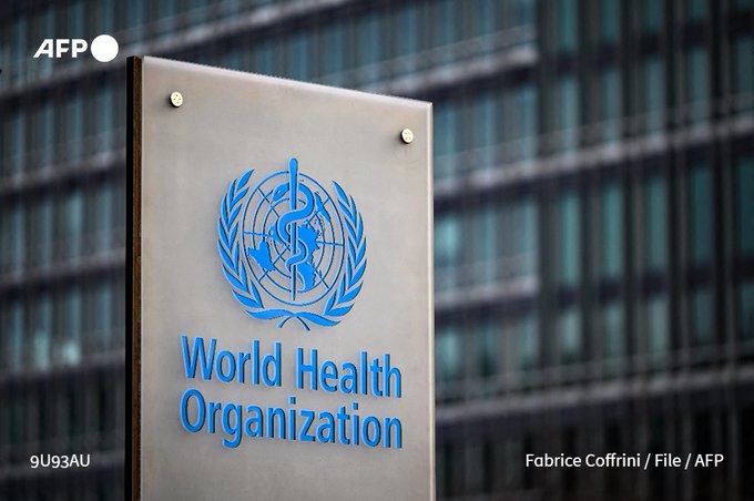This photograph taken on December 7, 2021 shows a sign outside the World Health Organisation (WHO) headquarters in Geneva.