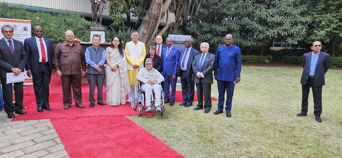 Sharing a moment with participants of the International Day of Non-violence who laid flower petals at the statue of Gandhi @uon.