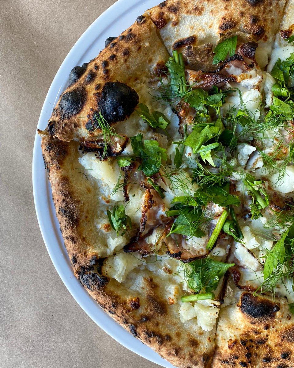 Patate e Guanciale with grana padano, potato, mozzarella, guanciale, and parsley. Available this month at @pastariastl & @PastariaTN - brought to you by Pastaria Nashville Executive Chef Evelynn Hadsell.
