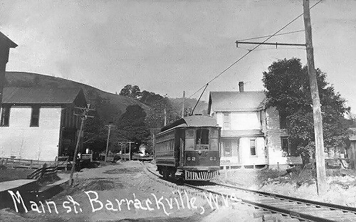 americanrails's tweet photo. The largest end-to-end interurban system in West Virginia was the Monongahela West Penn's (MWP) operations serving Weston, Clarksburg, and Fairmont. 

Its main line of 49 miles was built to high standards and capable of carrying standard railroad equipment, which it utilized to handle some freight business.  

The MWP here also contained branches to Wolf Summit (closely following the B&O's main line), Wyatt, Fairview, and Mannington.  This scene, circa 1913, features the interurban's Mannington Branch at Barrackville (near Fairmont).

The MWP also operated the interurban system connecting Parkersburg, WV and Marietta, OH but never made an effort to connect the two networks. 
 The branch pictured here was abandoned in 1933, followed by the main line in 1947 (converted to buses).

https://t.co/zUgWgvx9Xu