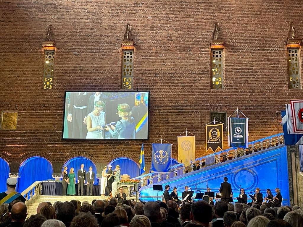 Dr. Hannah Klaubert | @hannahklaubert@h-net.social (@hannahklaubert) on Twitter photo The Swedes definitely know how to mark a special occasion! For my doctoral ceremony, I got a laurel wreath and a banquet in the golden hall at Stockholm city hall. Dress code was white tie and <a href="/astoeb/">Anna Stöber</a> looked even more dapper than at our wedding. ✨🌿 #phdone The Swedes definitely know how to mark a special occasion! For my doctoral ceremony, I got a laurel wreath and a banquet in the golden hall at Stockholm city hall. Dress code was white tie and <a href="/astoeb/">Anna Stöber</a> looked even more dapper than at our wedding. ✨🌿 #phdone