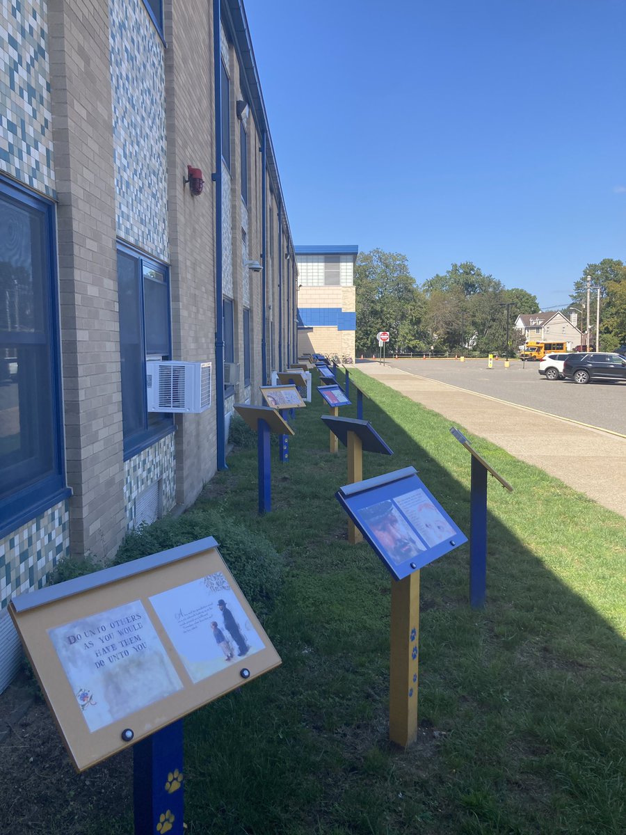 SJGPride's tweet photo. The SJG book walk is open!  Thank you to Mrs. Heider, her father, and the HSA for taking an underutilized space and turning it into a learning opportunity.  The next phase is a path that will be created along the walk. Books will be changed each month.  Come and enjoy!! https://t.co/zfGGDvPuQX