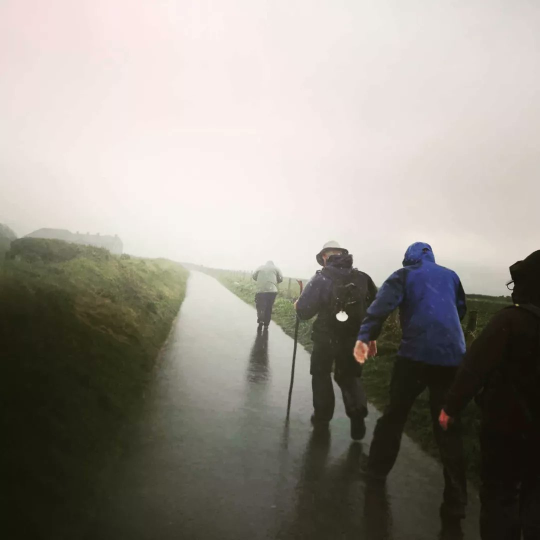 Waterfordcamino's tweet photo. We smiled thru' the storm 'til we made it to the other side ☔😎🌈 #stdavidsway #wales #camino #pilgrimpath #stdavidsday #stdavidscathedral https://t.co/KJCdk3Nhvi