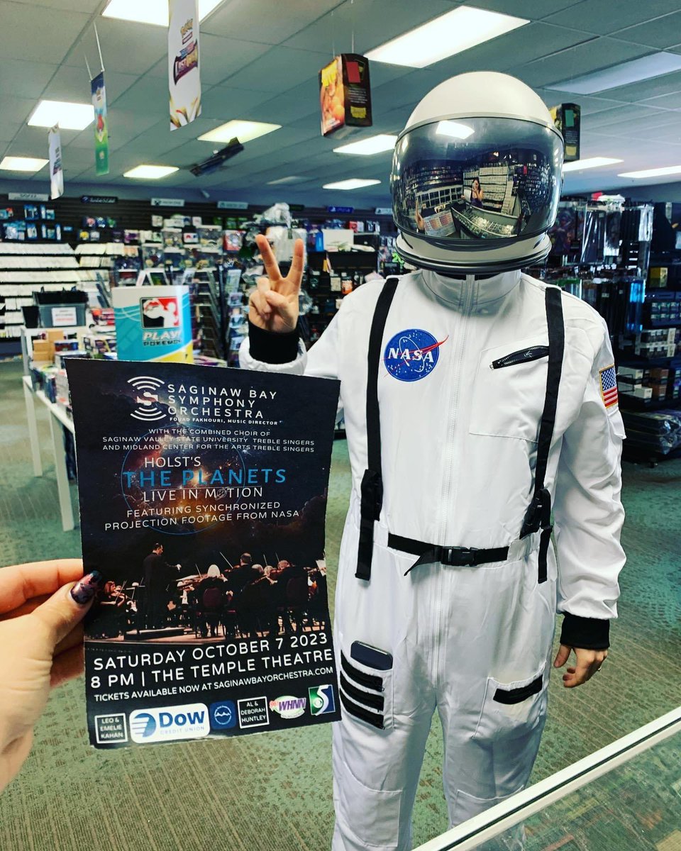 GameOnMichigan's tweet photo. We were just visited by a space man!!! 👨‍🚀

After you leave our shop this Saturday night (Oct 7th at 8pm) you should check out the local orchestra! They are holding a synchronized symphony with projection footage from NASA! 🪐🚀💫 https://t.co/rf8z4E1Dd1