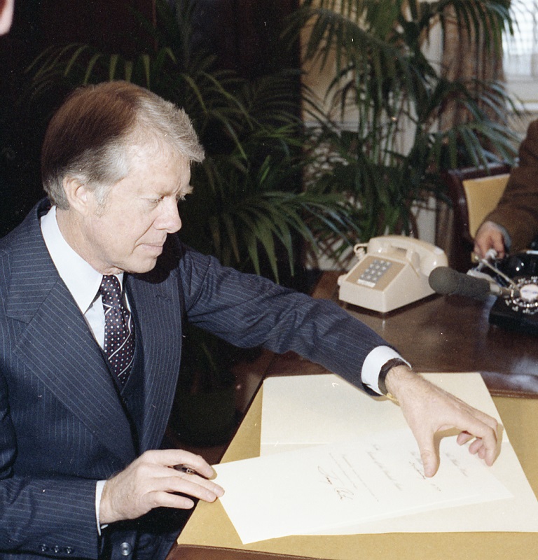 Today we kick off Pres. Carter's 100th year with a new campaign! 100 never-before-shared images from the WH photog. collection! #100Years100Images Up first-his first act as President: on 1/20/77 he signed his nominations. NAID 173369 #JC100 #JimmyCarter100 #Celebrate100Years.