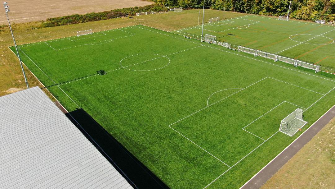 New drone photos of HFC's main soccer complex with the additional light pole installed on Mark Strothkamp Memorial Field. Great players and great facilities. #hfcfamily🧡⚽️🖤