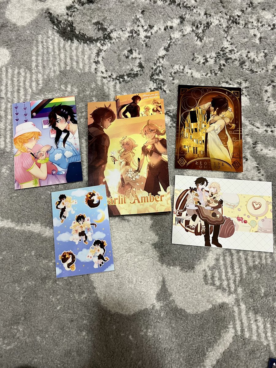 aziantearz's tweet photo. Got my @starlit_amber bundle a while ago! Adding to my growing collection of my Genshin Impacy HaremLunine zines hehehe https://t.co/tkswEW6Nd9