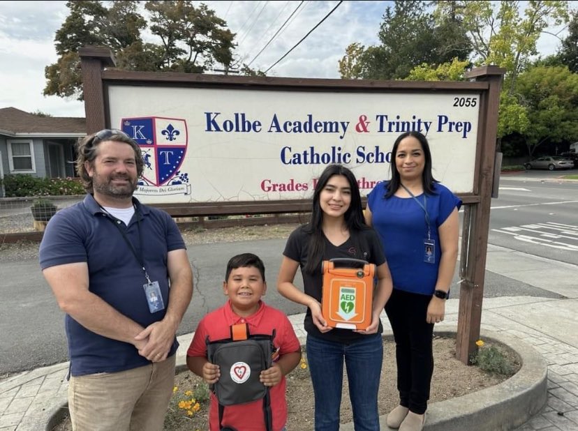 It’s Sudden Cardiac Arrest Awareness Month.  A great time to donate AEDs!  Kolbe Academy and Trinity Prep in Napa was the recipient of an AED. Accepting the AED is Principal Phillip Duncan. It will be placed in their athletics office.