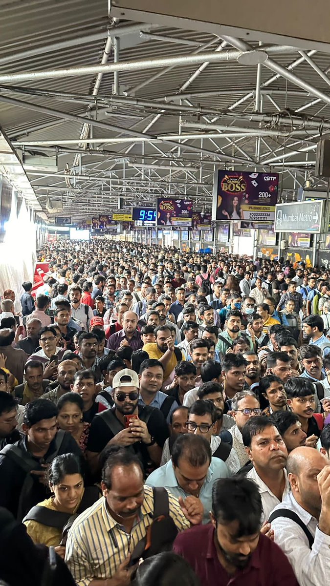 kariahiren1's tweet photo. Today 3/10/23 at 9.45 am. See the rush to enter Ghatkopar Metro. This is every day story . Tremendous pressure on the transportation infrastructure of Mumbai. Local trains are crowded, metro’s are packed, traffic jam everywhere. @RoadsOfMumbai @mumbaimatterz @Central_Railway https://t.co/iWQRlQynfa
