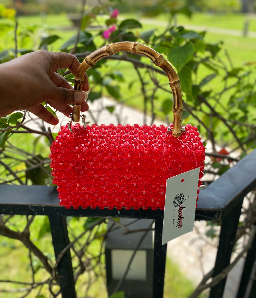 Bag Aseda Price: 380GHS Colors: Off white & Red only. Dimensions: 7.8 (W) x 4.2 (L) x 2.8 (B) in *Bamboo handle* Available on Made to Order basis (3-10 working days)