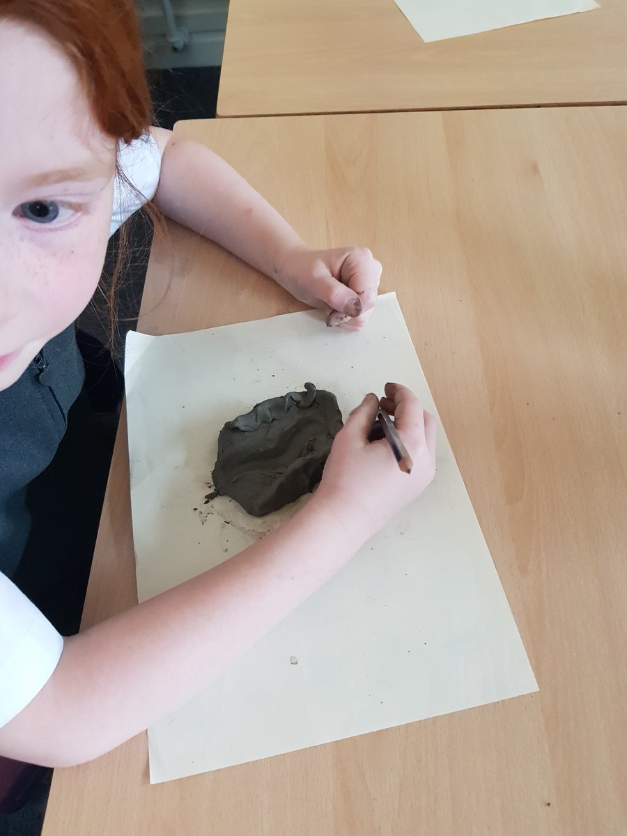 Emmaus_School's tweet photo. #EmmausY3 have been learning about rivers in geography and used modelling clay to create a v-shaped valley and to replicate erosion. #EmmausGeography https://t.co/TKayb7bMp4