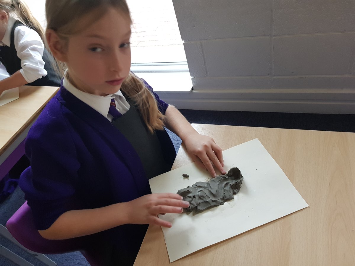 Emmaus_School's tweet photo. #EmmausY3 have been learning about rivers in geography and used modelling clay to create a v-shaped valley and to replicate erosion. #EmmausGeography https://t.co/TKayb7bMp4