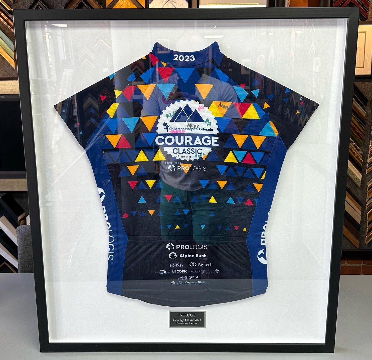 5280customframe's tweet photo. 🚴🏻‍♂️ Custom framed Courage Classic jersey and name plate for our friends at @ChildrensColo! #art #denver #colorado #pictureframing #customframing #5280customframing #jerseyframing #sportsframing #courageclassic #childrenshospitalcolorado @truvueglazing @Crescent_CP @LarsonJuhl https://t.co/kJWy4jYOxb