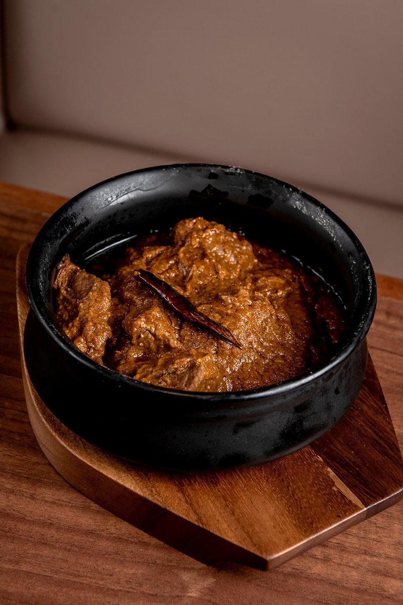 Lift the lid on @chefatulkochhar’s Ahuna gosht curry 🍛 Recently featured on @sat_jamesmartin, this traditional East Indian lamb curry is a rich, hearty, deeply satisfying main that’s packed full of flavour 😋 #currylover #indianfoodlovers #indianrestaurant #londonrestaurants