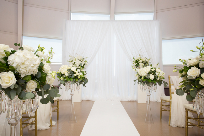 Another stunning ceremony aisle where the decor and flower elements were later repurposed as head table decor 
Photo: DA Photography #weddingceremony #ceremonydecor #ceremonybackdrop #ceremonyflowers