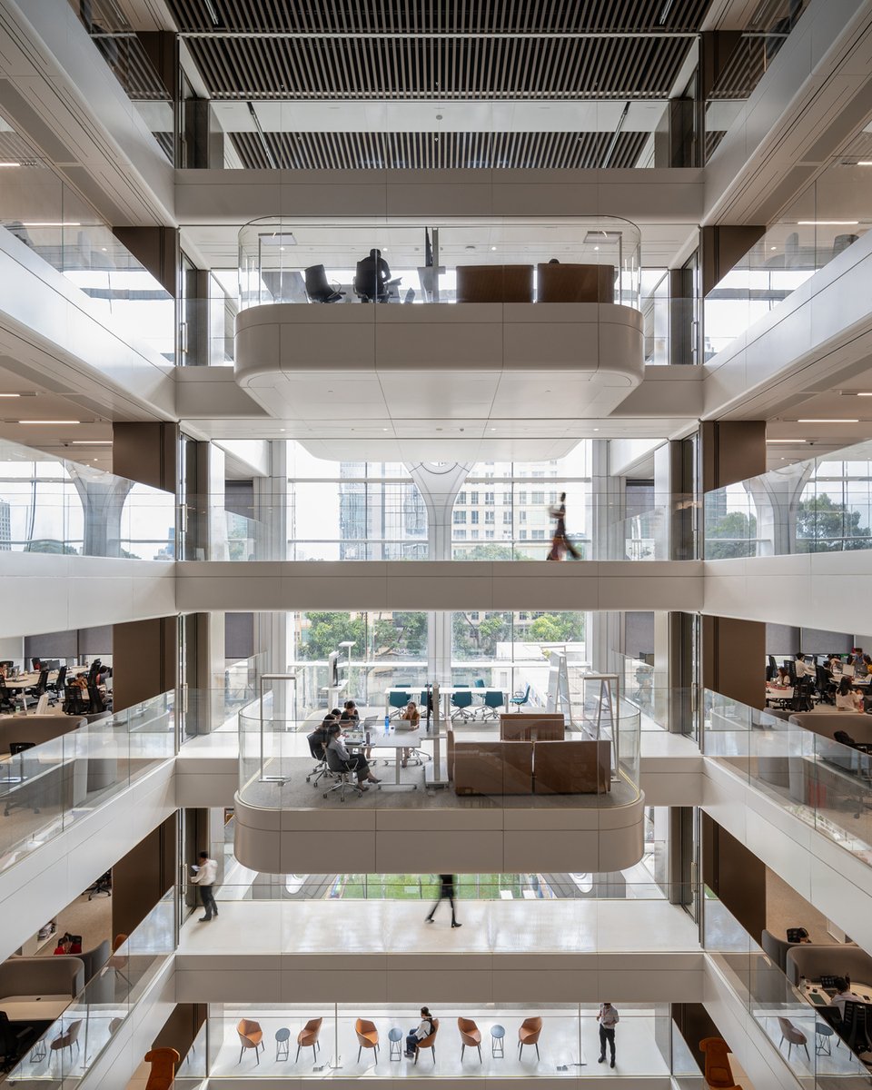 FosterPartners's tweet photo. Building on the design for the Techcombank HQ in Hanoi, @FosterPartners has completed a new office tower for the company in Ho Chi Minh City.

The design creates a light-filled environment, with three central atria that rise to different heights. 

🔗https://t.co/InjGcSPzSB https://t.co/lZJtXJe1z5