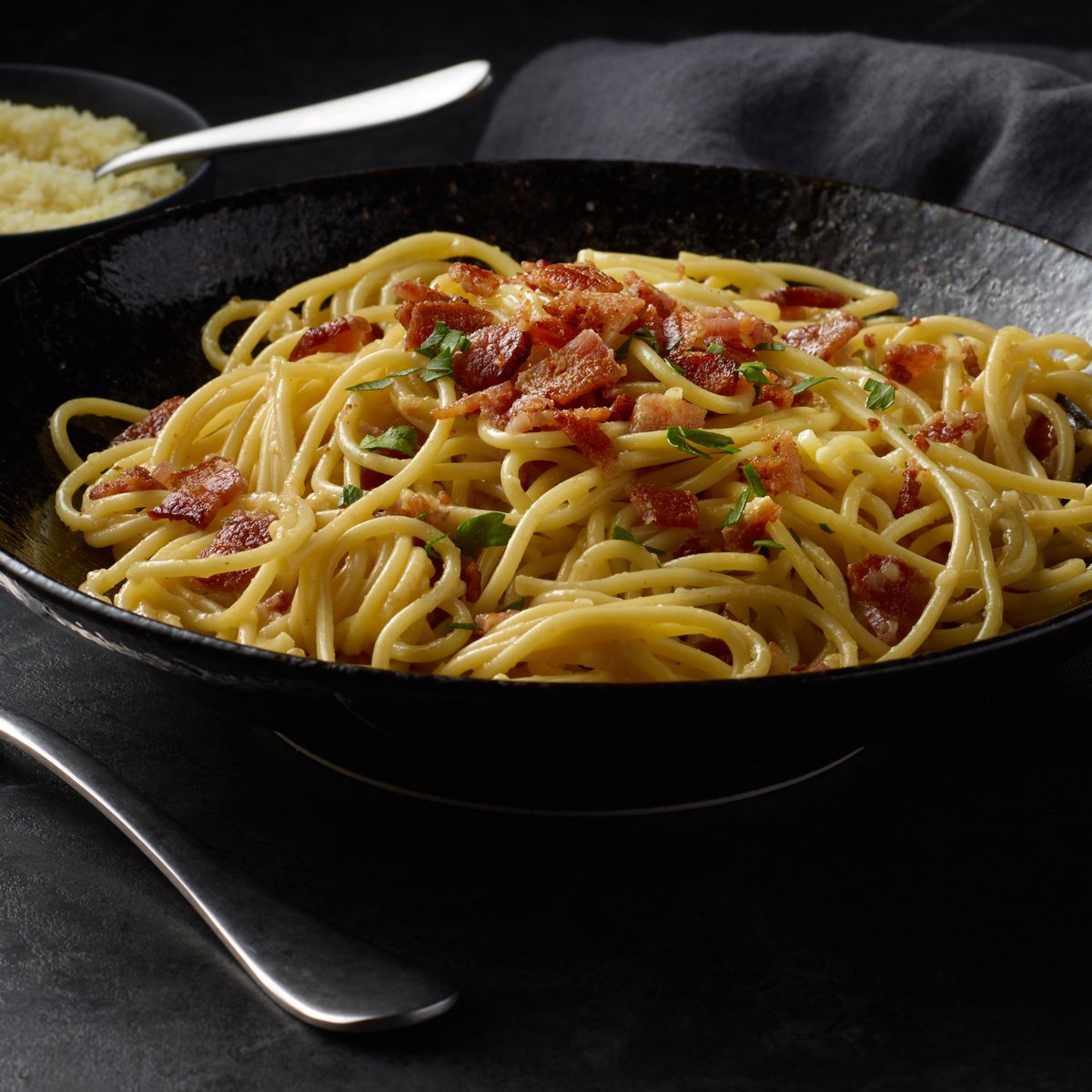 Brace yourselves for the ultimate comfort food: Creamy Carbonara with a bacon twist! 🥓🍝 Indulge in a velvety pasta masterpiece that's packed with crispy bacon goodness. It's love at first bite