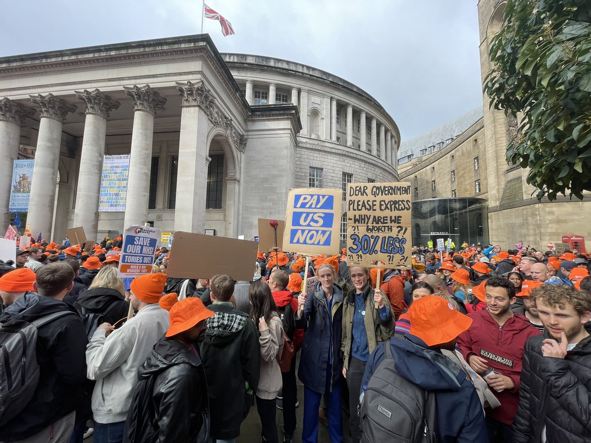 TheBMA's tweet photo. Today junior doctors and consultants rallied on the doorstep of the Conservative Party Conference in Manchester to show the government that we will not be silenced.

Thank you to everyone who came along. Together we will continue, stronger than ever, towards full pay restoration. https://t.co/PtJ1P1XyHB