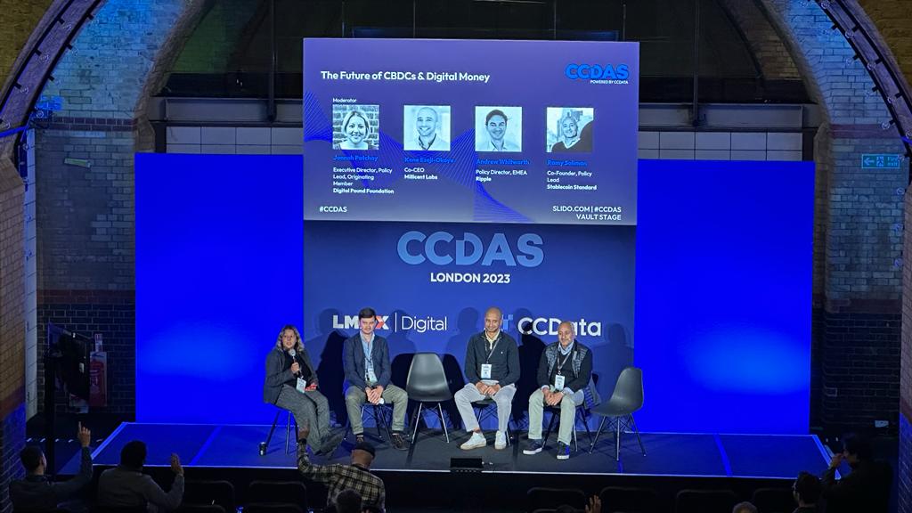 digitalpoundfdn's tweet photo. A shot from today's #CCDAS event courtesy of our friends @TRGLondon. Jannah Patchay is on stage with Andrew Whitworth (@Ripple), Ramy Soliman (Stablecoin Standard), and Kene Ezeji-Okoye (@MillicentLabs), talking about the future of digital money.
...
#CBDC #Stablecoins #Ripple https://t.co/qiEqQmEWfF