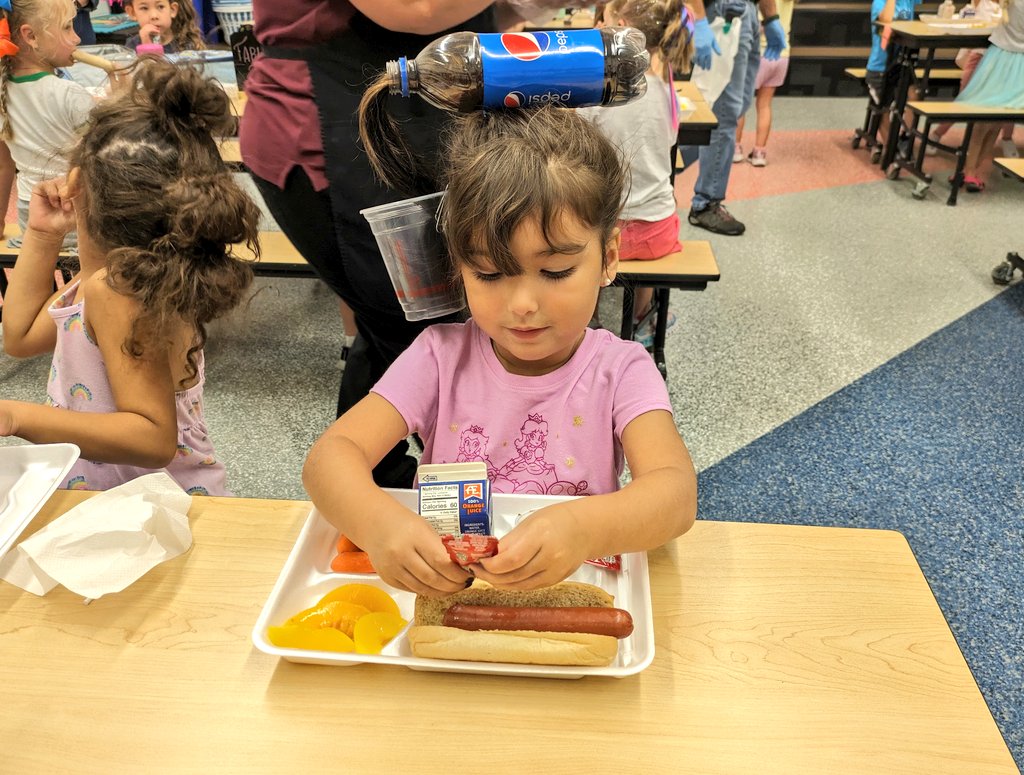 How about a little Pepsi with that school lunch? This kindergartner is rocking the crazy hair day during PC Fun Run Week!