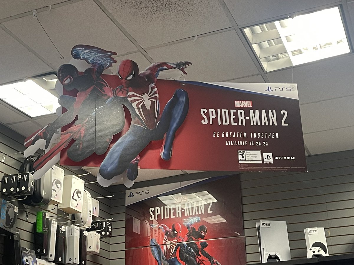 EvanFilarca's tweet photo. My local GameStop is preparing for the launch of Marvel’s Spider-Man 2, featuring some BRAND NEW PROMO ART for the game! #SpiderMan2PS5 #BeGreaterTogether 🕷🎮 https://t.co/tl1SM1YaXV