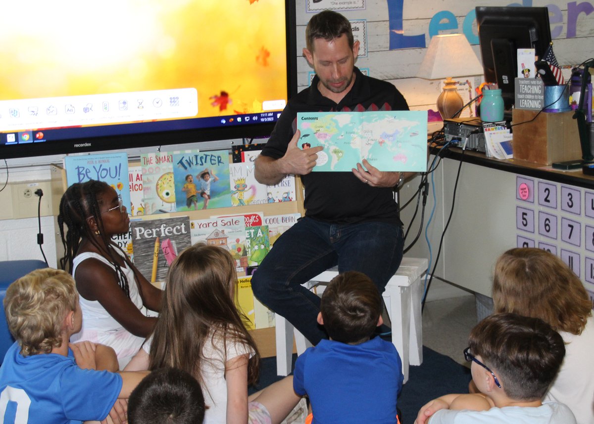 SpencerportCSD's tweet photo. Third graders at Bernabi and Munn also received a visit from the Spencerport Rotary and a copy of the book, A Ticket Around the World. #GratefulRangers Thank you, #SpencerportRotary! https://t.co/V9Ox96wvoj
