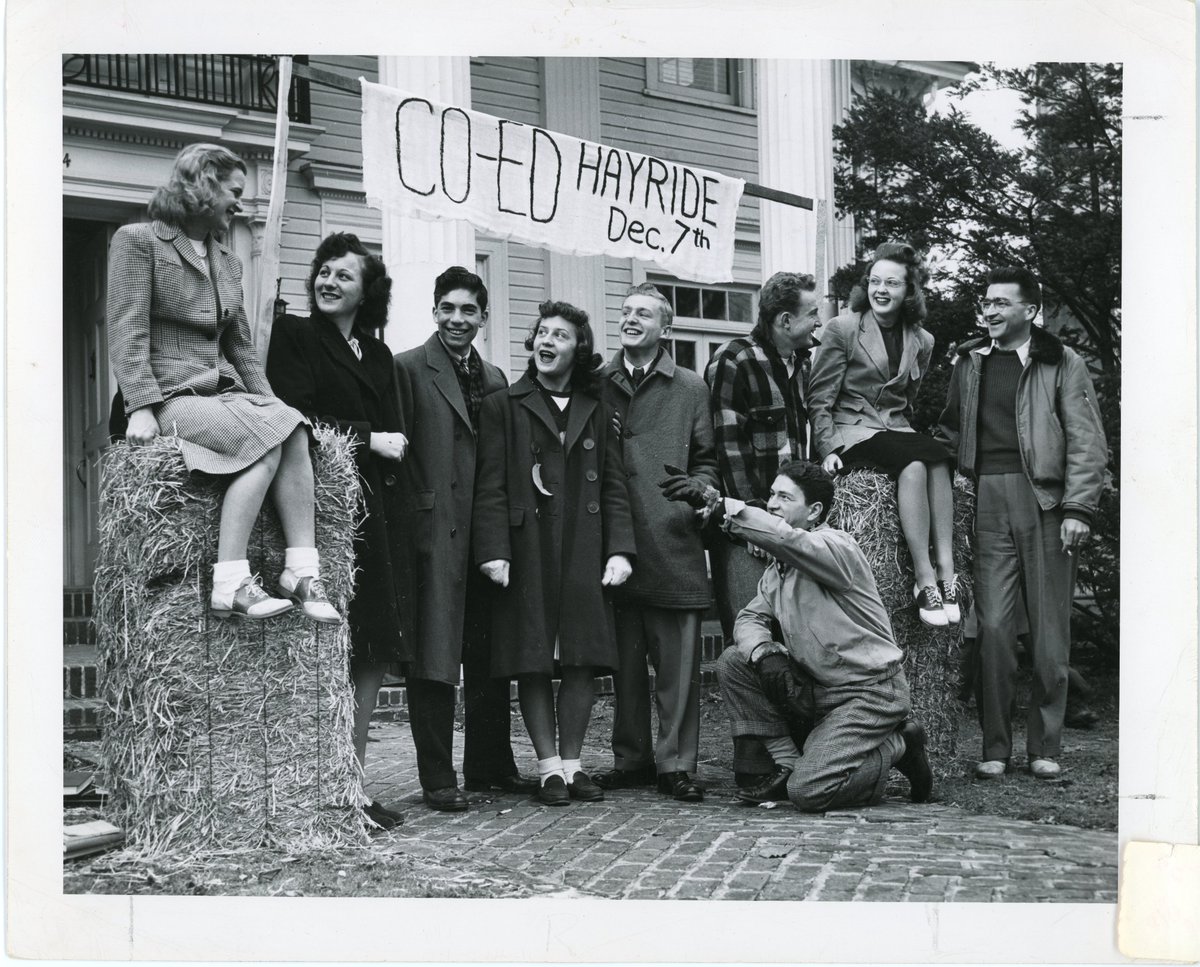 It’s October, grab your bales and head to the campus co-ed hayride! Triple Cities College (TCC) students are pictured here in 1947 in front of Colonial Hall in Endicott, NY. TCC was the predecessor of Harpur College, which became <a href="/binghamtonu/">Binghamton University</a>.

#ArchivesU
#ArchivesHashtagParty