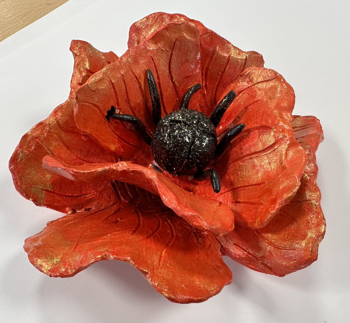 DTC_ECTLead's tweet photo. The first 7 of approximately 140 clay poppies finished for our November installation. These are a selection from our new Yr9 GCSE art students as part of their induction onto the course. We can’t wait to see them on display! @DixonsTC https://t.co/AZU8qlqb8o