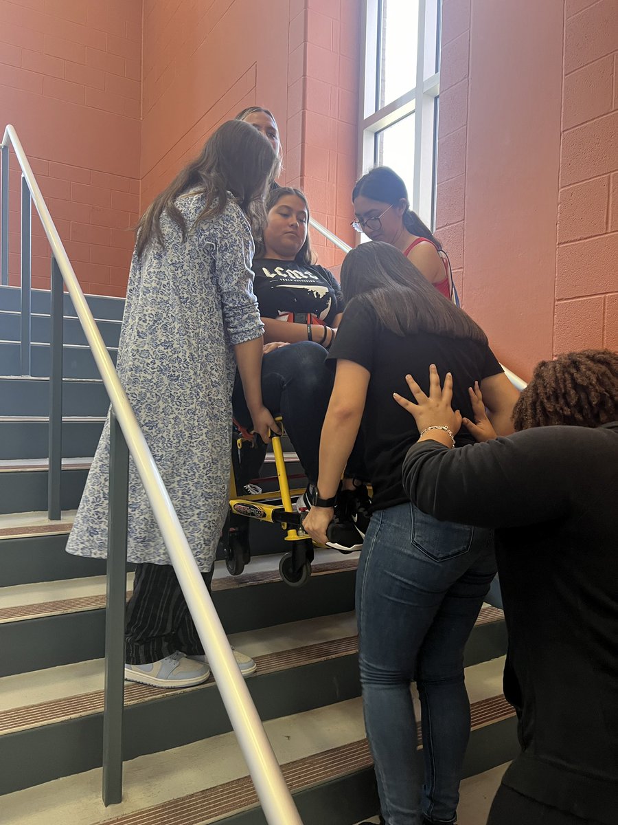 dear_darcie's tweet photo. The EMT students are learning how to use a stair chair today!
We are practicing several ways to move patients safely.
It also happened to be dress like a super hero or a granny hints the attire 😂
@NISDBrennan @NISD_CTE #futureEMT https://t.co/XFS7jmN8ul