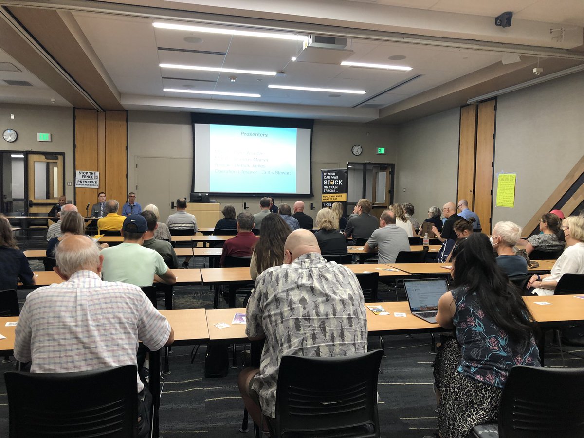 ericafora2's tweet photo. Packed house tonight. Around 150 present to oppose MDOT Rail’s proposal to fence off the railroad to ostensibly improve pedestrian safety, with zero investments to improve pedestrian access under/over railroad and no accommodations for wildlife. No thanks MDOT. https://t.co/ElK9eEclZb