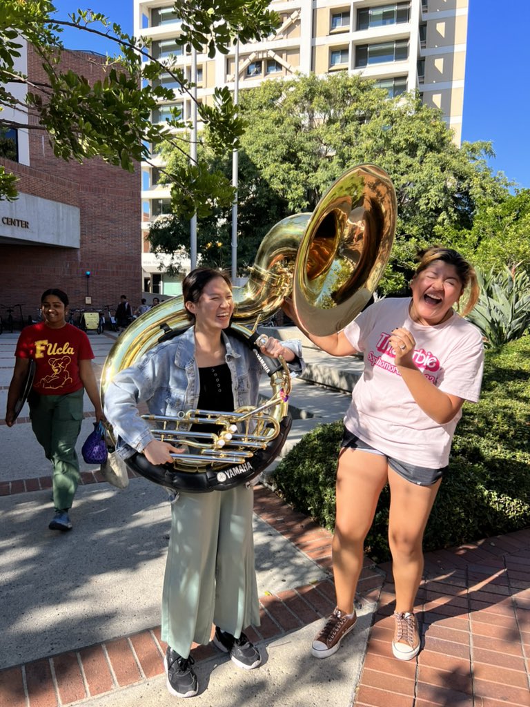 Michelle teaching Ashley how to use the tuba #fighton