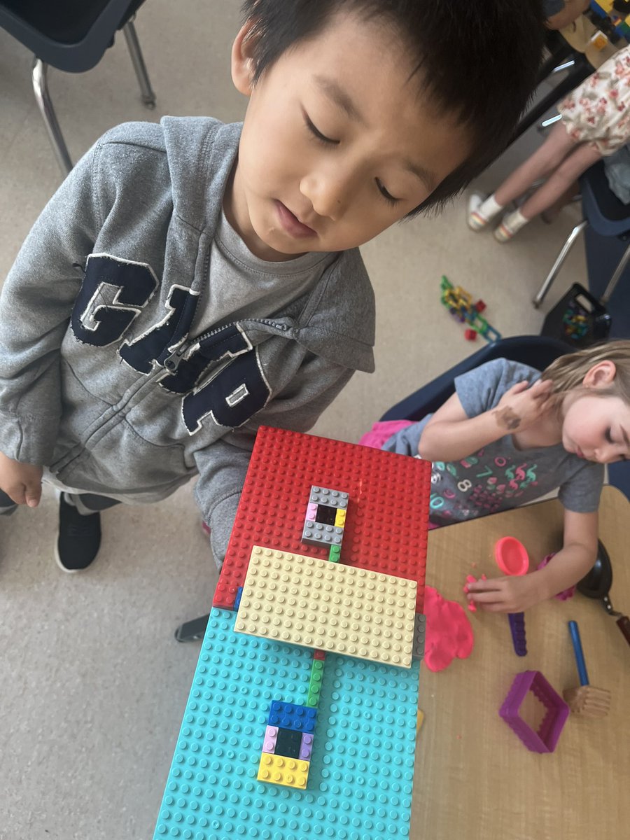A beautiful morning in kindergarten. This student always invites me into his play when I'm in his classroom. Fancy block work today! And creativity abounds with this Lego face wearing glasses! #ilovekindergarten