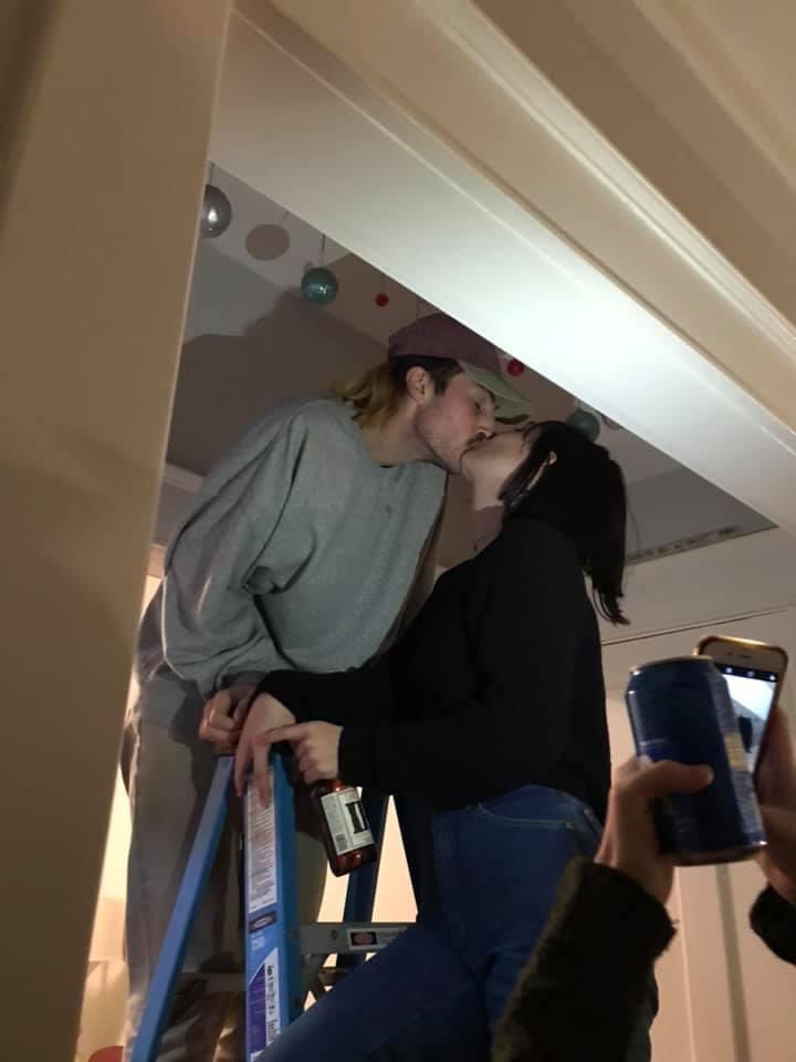 lilladyjj's tweet photo. Look at how ridiculous and dramatic this photo is -carter and I making out at college party on a freakin ladder holding lagunitas https://t.co/LSwpEpdrlv
