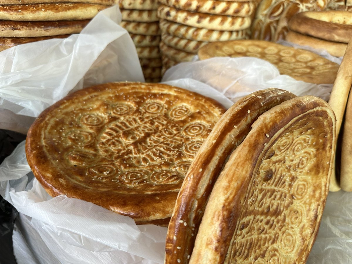 Navbahor's tweet photo. Uzbekistan: Ferghana bread. Don’t ask me which region’s is my favorite. All I can say: You can’t have enough of it. Around 50 cents per loaf here in Rishton. https://t.co/tC5wbfyVhN