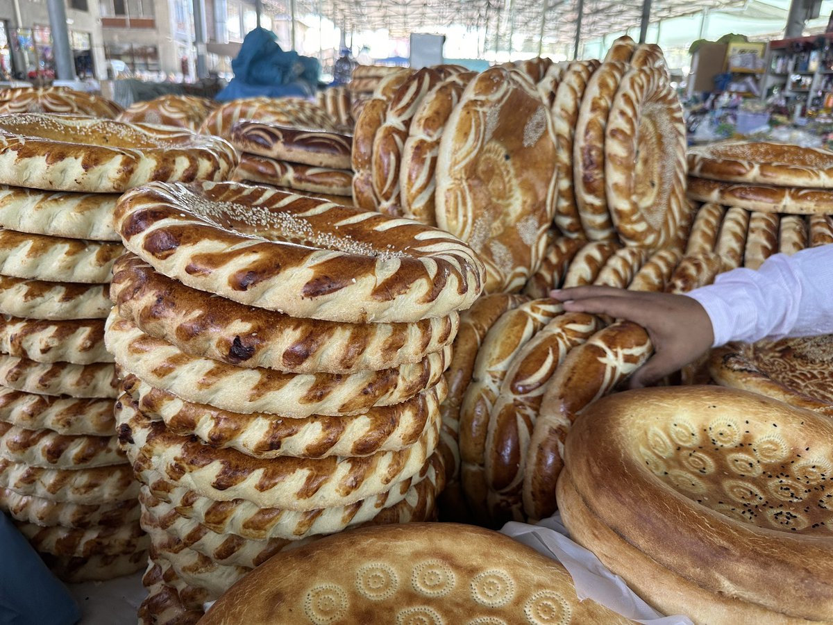 Navbahor's tweet photo. Uzbekistan: Ferghana bread. Don’t ask me which region’s is my favorite. All I can say: You can’t have enough of it. Around 50 cents per loaf here in Rishton. https://t.co/tC5wbfyVhN