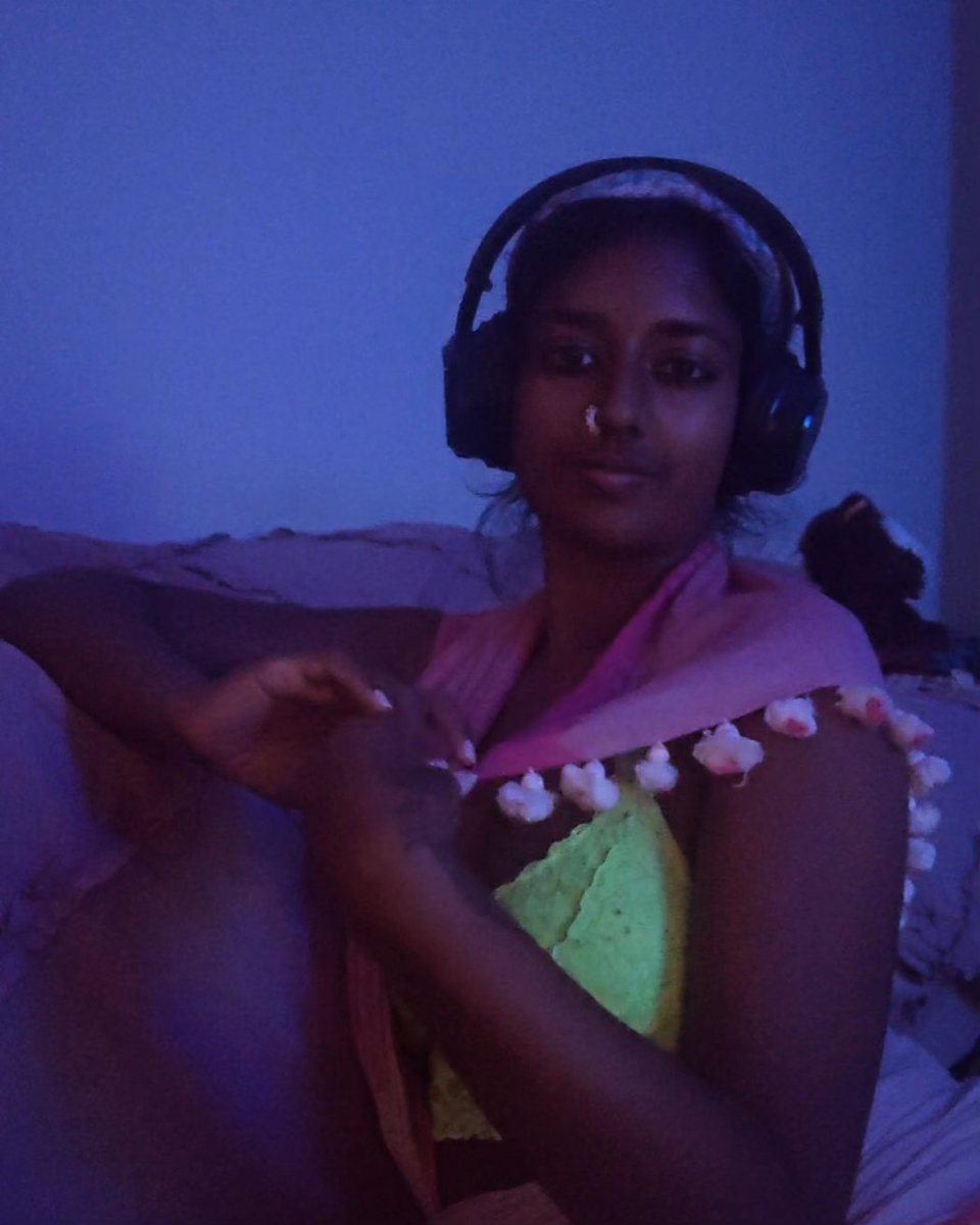 Dim lighting, a cotton sari, and brown noise playing on my headphones. Sensory rest. #brownSkin #autisticAdult