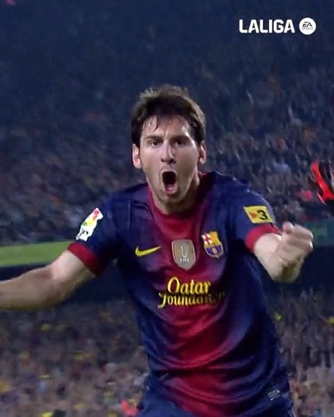 A screenshot from LaLiga EA Sports showing soccer player Lionel Messi in a Barcelona jersey celebrating intensely with arms outstretched in front of a crowd.