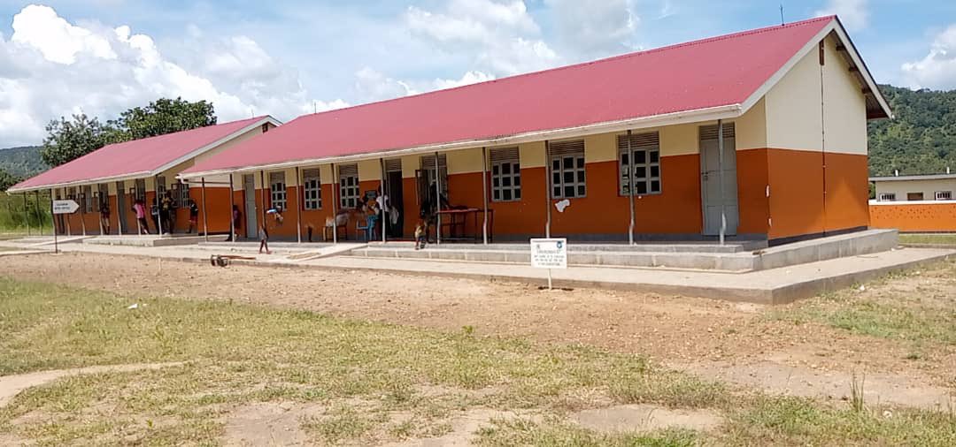 DRDIP constructed two blocks of four classrooms each, three blocks of five stance drainable latrines. Supply of furniture and installation of 10,000 liter stainless steel rain water harvest tanks at Tika Primary School in Moyo District.