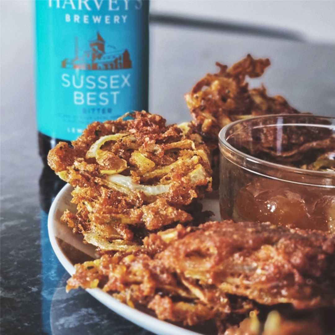 Spice up #NationalCurryWeek with Sussex Best Bitter! 🍺🌶️ Whether dining out, ordering in, or cooking at home, elevate your curry experience. 🍻 

Try our 'Best Bitter Onion Bhajis' recipe for a perfect pairing! 🍛

buff.ly/3ZWImRz