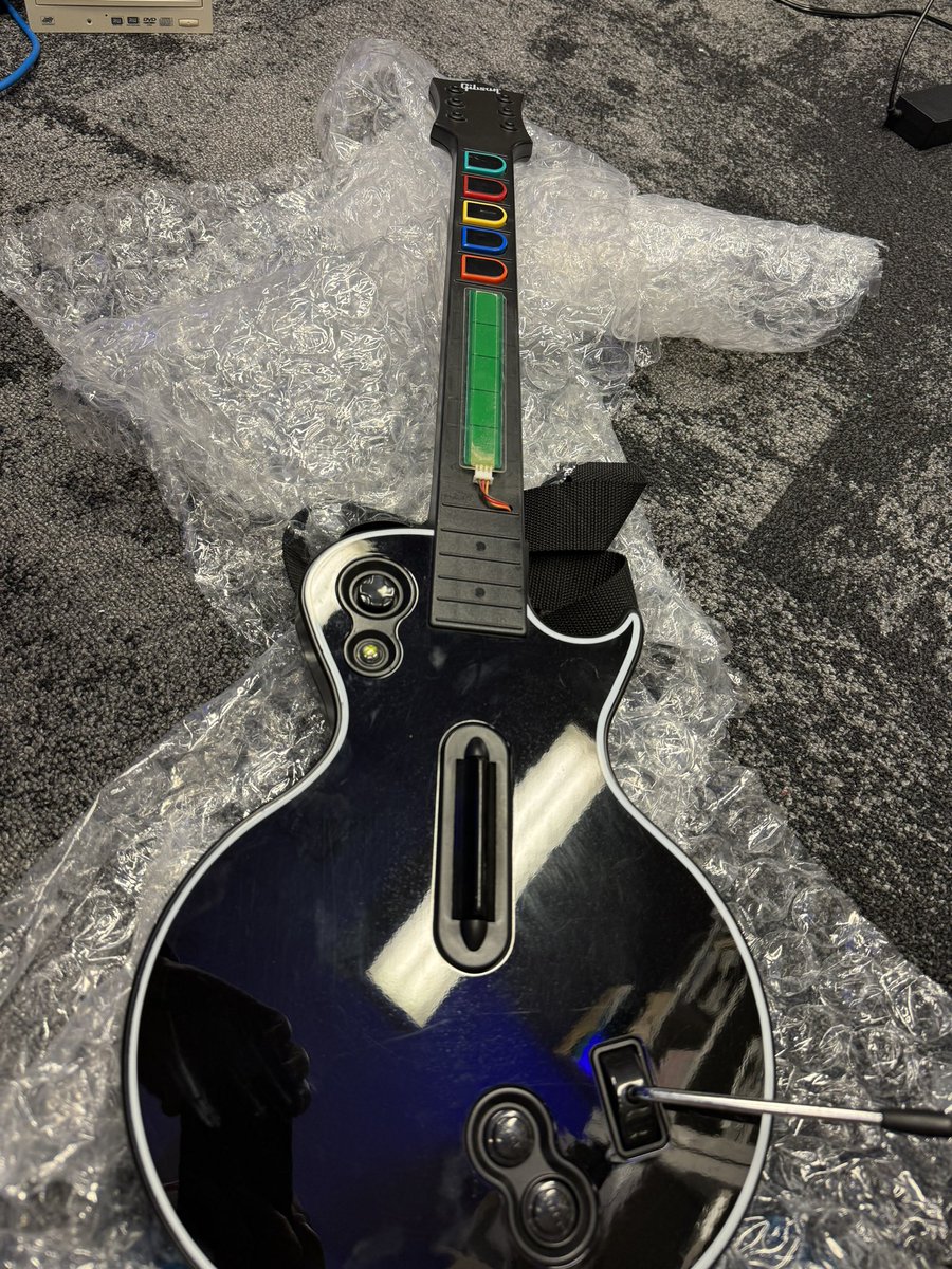 Borman18's tweet photo. A recent acquisition to @museumofplay, a prototype Guitar Hero World Tour controller! https://t.co/I7MPLcEiYc