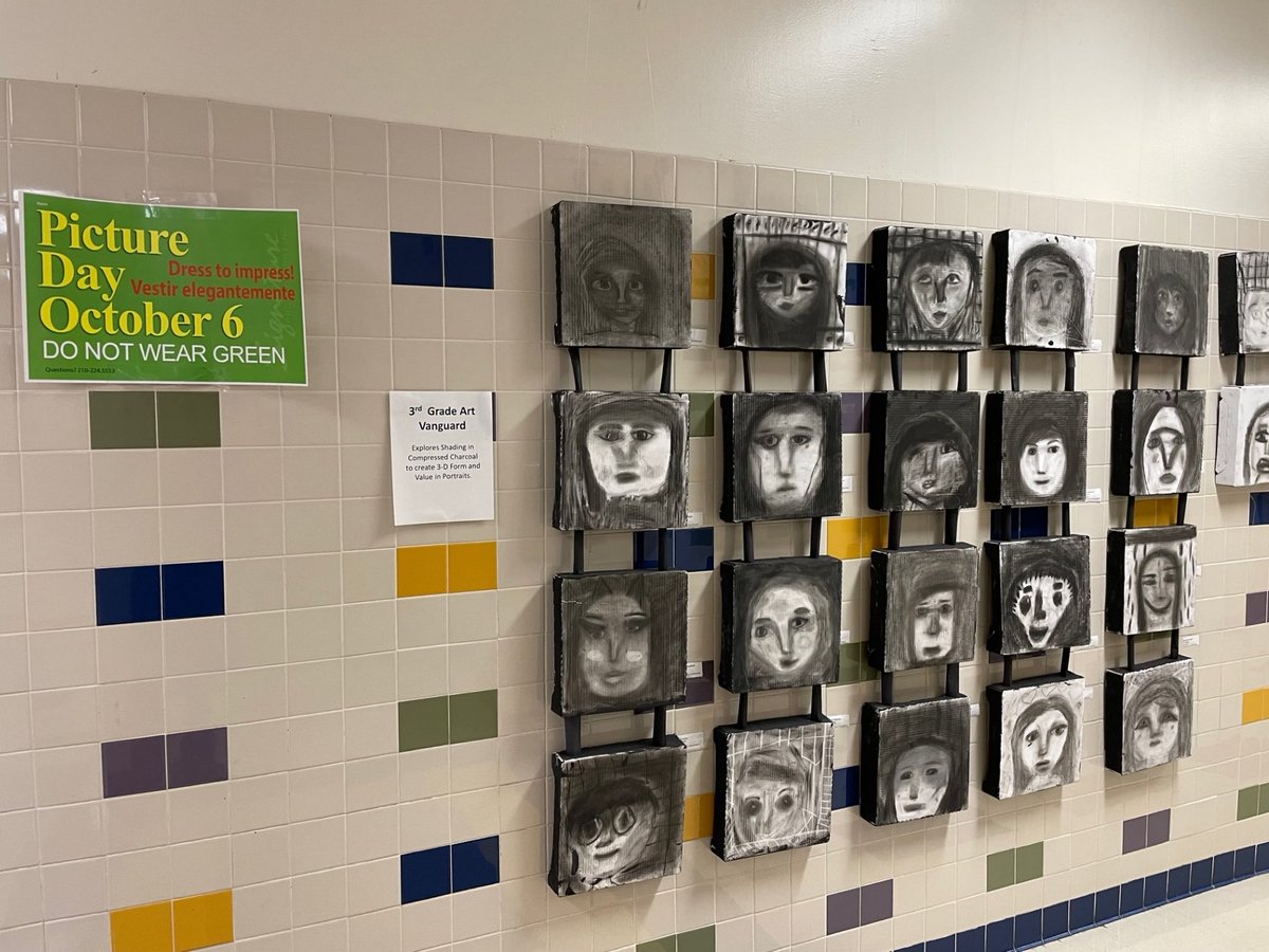 StaffordES_Lib's tweet photo. It took me a minute to process that picture day is coming up in two days. At first, I thought these portraits outside the @StaffordEISD Library were the results of picture day, but I think they are self-portraits from Ms. Waid's art class. I think... https://t.co/crkqNAkzLA