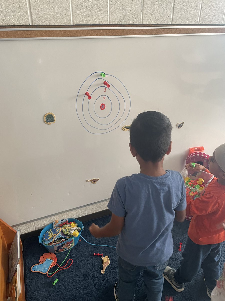 Turning an interest (throwing sticky toys at the white board) into a learning opportunity (addition, turn taking, friendly competition) They love it! #fdk #playbasedlearning #studentlead <a href="/RossDrive/">Ross Drive P.S.</a> <a href="/PeelSchools/">Peel District School Board</a>